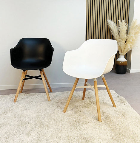 Black armchair 'MELIS' with metal and natural wood legs Black armchair 'MELIS' with metal and natural wood legs