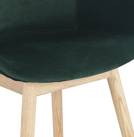 Green velvet chair 'FRIDA' with armrests and legs in natural wood