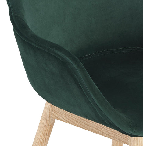 Green velvet chair 'FRIDA' with armrests and legs in natural wood